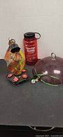 Group shot showing feeder, nectar bottle, dome cover, ornament