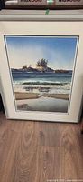 Front view of framed West Beach lithograph showing full artwork, mat and frame