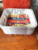 Front view of sealed stack showing Alcan label and quantity 30