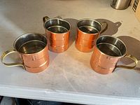 Four mugs group shot showing exterior color and handle design