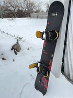 Full view of Burton snowboard with bindings attached
