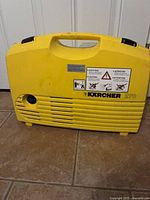 Front view of Kärcher 270 washer showing brand and caution labels