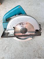 Front view of Makita 5600D circular saw showing blade guard and handle