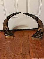 Both bookends front view showing full curved design