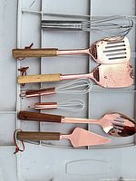 Full view of all seven utensils laid out