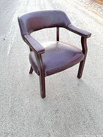 Front view of mahogany finish captains chair