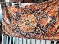 Full view of tapestry front showing overall design and hanging rings