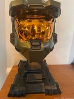 Front view of assembled Master Chief helmet on display stand