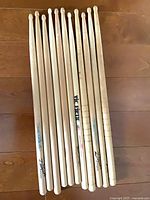 11 drumsticks laid flat showing overall quantity and branding