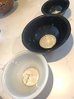 Three bowls separated to show colors and sizes