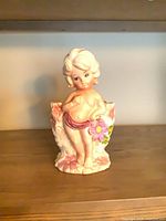 Front view of Relpo ceramic cherub planter