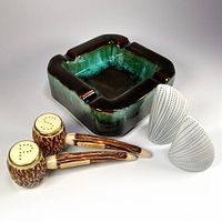 Ashtray, plastic pipe shakers, porcelain Urchin shakers grouped