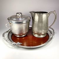 All three barware items arranged together on tray