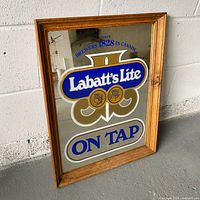 Front view of Labatt's Blue bar mirror in wood frame