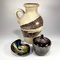 All three pottery pieces grouped