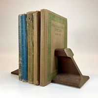 bookends holding five vintage textbooks, angled view