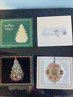 Overview of four boxed ornaments—two open, two closed
