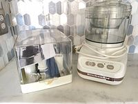 Mini food processor base, bowl and separate accessory storage case