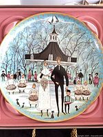 Close-up of 'Summer Wedding' collector plate in pink molded insert