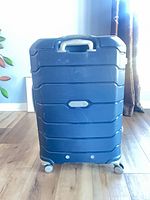 Front view of Samsonite hard-shell spinner suitcase