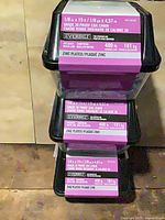 Stack of three Everbilt chain tubs showing front labels