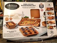 Front of boxed Gotham Steel Diamond 5-piece bakeware set showing all included pans