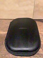Closed black Bose hard case front view