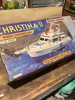 Front of box showing Christina II RC boat graphics and features