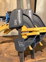 Pair of Mastercraft clamps showing handles and jaw pads