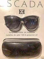 Escada sunglasses and case sealed on retail backing card