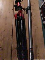 Tripod folded next to monopod showing overall form and color