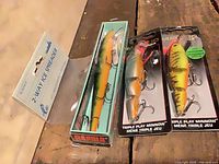 All packaged items: ice spreader, Rapala floater, two Matzuo minnows