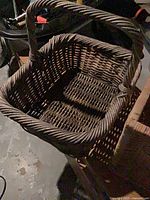 Dark brown handled wicker basket