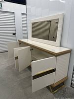 Mirror displayed atop a dresser showing frame texture and scale