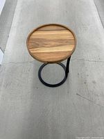 Top-down view of round wood side table