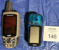 Front view of two Garmin handheld GPS units, models GPSmap 60CSx and eTrex Legend