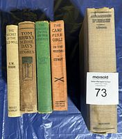 Spines of all five clothbound books