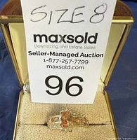 Ring in box with size tag visible