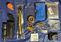 Full layout of survival items on blue background