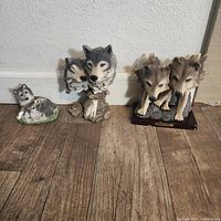 All three wolf figurines side by side