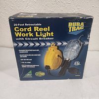 Front of boxed Dura Trac 20-ft Cord Reel Work Light
