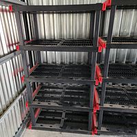 Full view of single Craftsman shelving unit showing five shelves and red connectors