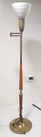 Full view of brass and teak floor lamp showing overall design and height