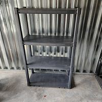 Front view of Sterilite four-tier shelving unit