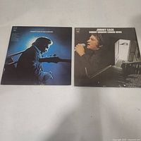 Front covers of both Johnny Cash LPs