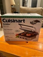 Retail box front showing product, brand and features