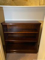 Front view of wooden bookcase showing overall structure