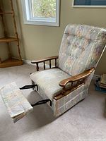 Front view with footrest extended showing overall design