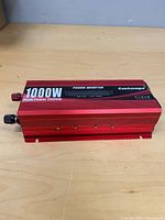 Top view showing Cantonape branding, 1000W rating and red aluminum body