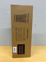 Box side panel listing package contents: 1 mop head, 4-piece handle